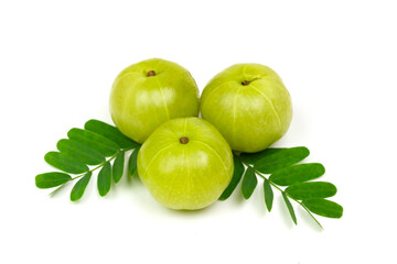 Pile of Indian gooseberry fruits or Amla (phyllanthus emblica) with green leaf isolated on white background.