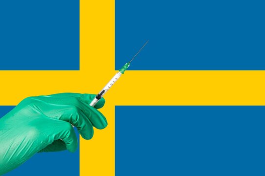 corona vaccination in front of a Sweden flag