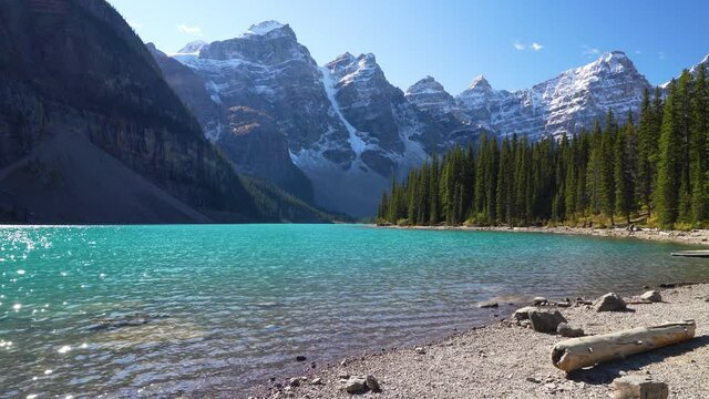 Moraine lake beautiful landscape in summer to early autumn sunny day morning. Sparkle turquoise blue water, snow-covered Valley of the Ten Peaks. Banff National Park, Canadian Rockies, Alberta, Canada