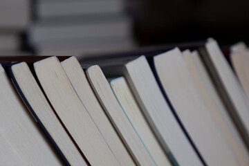 classic book collection, stacks of books in the background