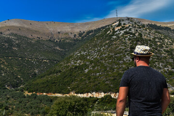 Fototapeta na wymiar Gazing on beautiful mountainside view in South Albania