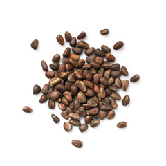 Unshelled pine nuts isolated on white