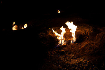 fire coming out of the rocks on the mountain " Chimera lights"