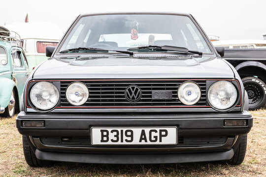 08/0/2019 Portsmouth, Hampshire, UK the front of aor Gold car with front grill and headlights