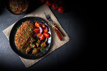 Buckwheat groats baked in the oven with beef goulash