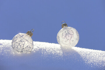 Christmas tree toys - white balls on fluffy snow