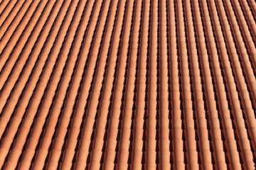 Traditional red clay roof tiles background. Top view