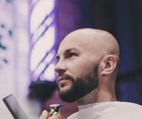 Barber hands trimming businessman.