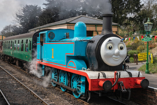 09/14/2019 Ropley, Hampshire, UK A thomas the tank engine steam train on a track making steam