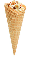 Ice cream in a waffle cone with peanuts and caramel isolated