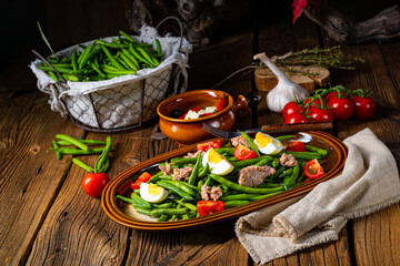 Rustic green bean salad with egg and tuna