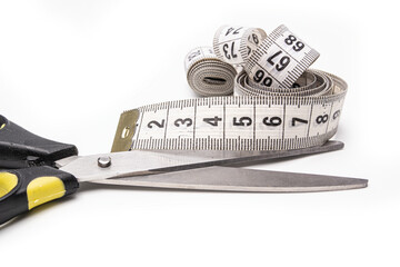 Roulette with a pair of scissors for the seamstress on a white background
