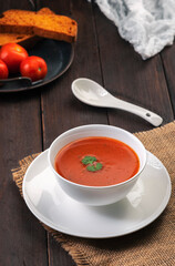  creamy tomato soup served in a bowl