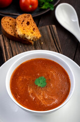  creamy tomato soup served in a bowl