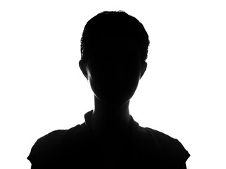 Female person silhouette in the shadow, back lit light