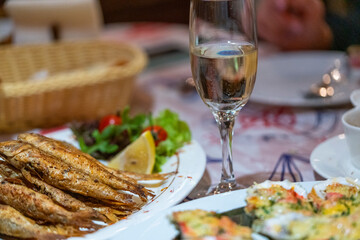 fried fish, seafood and wine