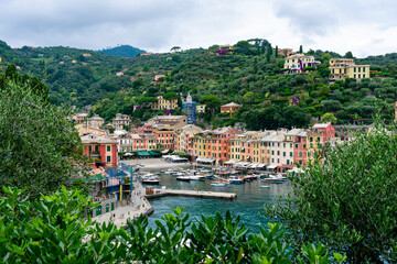 Fototapeta na wymiar Italy, Liguria, Portofino - 3 July 2020 - The magnificent Portofino surrounded by greenery