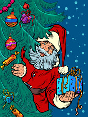 Santa Claus looks out from behind the tree. Christmas background