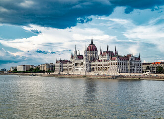 Fototapeta na wymiar Hungarian parliament building on the Danube embankment at late afternoon