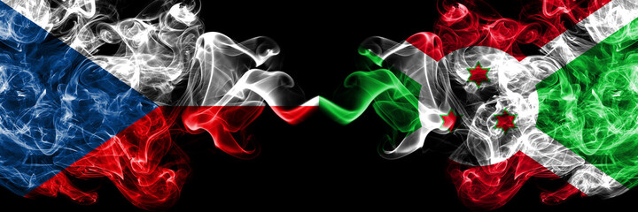 Czech Republic, Czech vs Burundi, Burundian smoky mystic flags placed side by side. Thick colored silky abstract smoke flags.