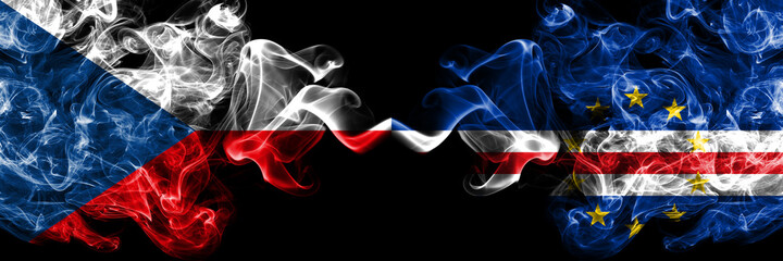 Czech Republic, Czech vs Cape Verde, Cabo Verde smoky mystic flags placed side by side. Thick colored silky abstract smoke flags.