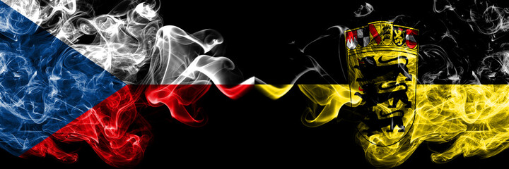 Czech Republic, Czech vs Germany, German, Deutschland, Baden Wurttemberg smoky mystic flags placed side by side. Thick colored silky abstract smoke flags.