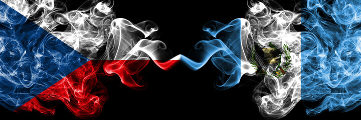 Czech Republic, Czech vs Guatemala smoky mystic flags placed side by side. Thick colored silky abstract smoke flags.