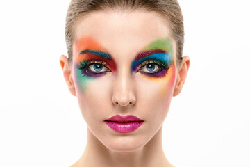 Beauty Fashion woman with Colorful Bright Makeup, sleek Hairstyle. Girl with blue eyes, stylish hair and make up. Beautiful model portrait, fashionable color trend make up.