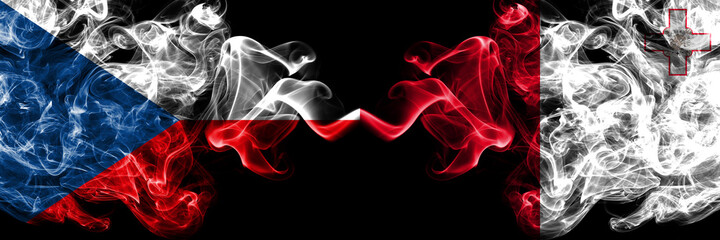 Czech Republic, Czech vs Malta, Maltese smoky mystic flags placed side by side. Thick colored silky abstract smoke flags.