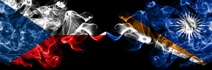 Czech Republic, Czech vs Marshall Islands smoky mystic flags placed side by side. Thick colored silky abstract smoke flags.
