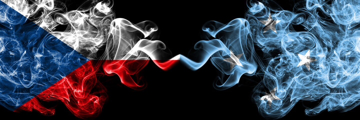 Czech Republic, Czech vs Micronesia smoky mystic flags placed side by side. Thick colored silky abstract smoke flags.