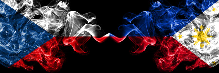 Czech Republic, Czech vs Philipines smoky mystic flags placed side by side. Thick colored silky abstract smoke flags.