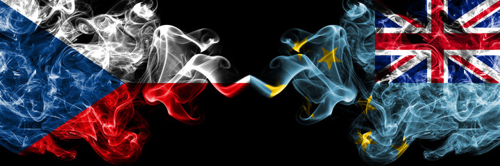 Czech Republic, Czech vs Tuvalu smoky mystic flags placed side by side. Thick colored silky abstract smoke flags.