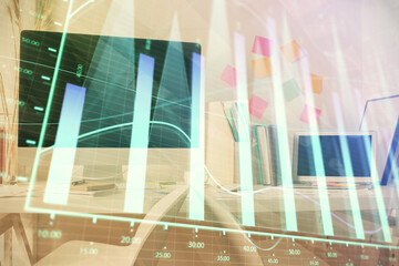 Double exposure of financial graph drawing and office interior background. Concept of stock market.