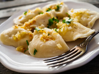 Dumplings - cheese noodles with onion
