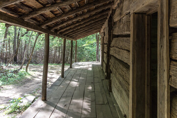 Log cabin front porch of historical structure in the Great Smoky Mountain National Park.