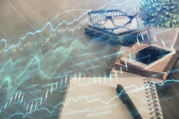 Double exposure of forex chart drawing and cell phone background. Concept of financial trading