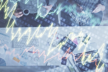 Double exposure of man and woman working together and financial chart hologram drawing. market analysis concept. Computer background. Top View.