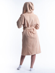 woman in a dressing gown from the back on an isolated white background.