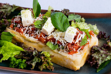 Delicious classic italian bruschetta on a tray. 