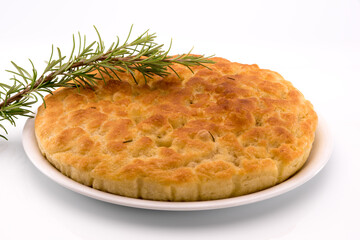 Traditional Italian Focaccia with rosemary homemade flat bread isolated on white background