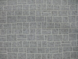 模様のある灰色の石壁