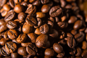 Roasted coffee beans on a silver background, close-up, space for text, Wallpaper, postcard, texture, background