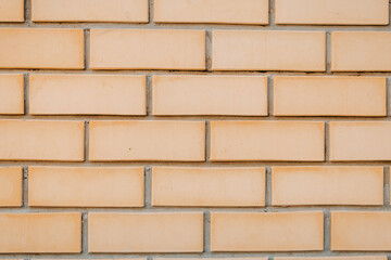 the texture of the beige brick wall