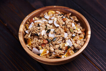 Granola in a wooden cup