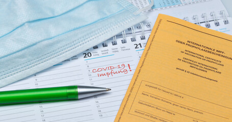 Obraz premium Calendar entry as a reminder for the Corona vaccination