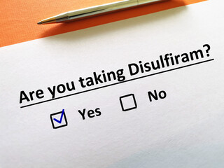 One person is answering question about psychiatric medication. The person is taking disulfiram