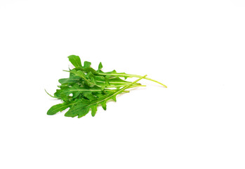 Natural vitamins in green arugula leaves on a white background