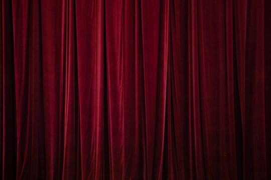 Red curtain in theatre background