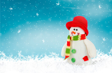 Happy snowman on a snowy background.